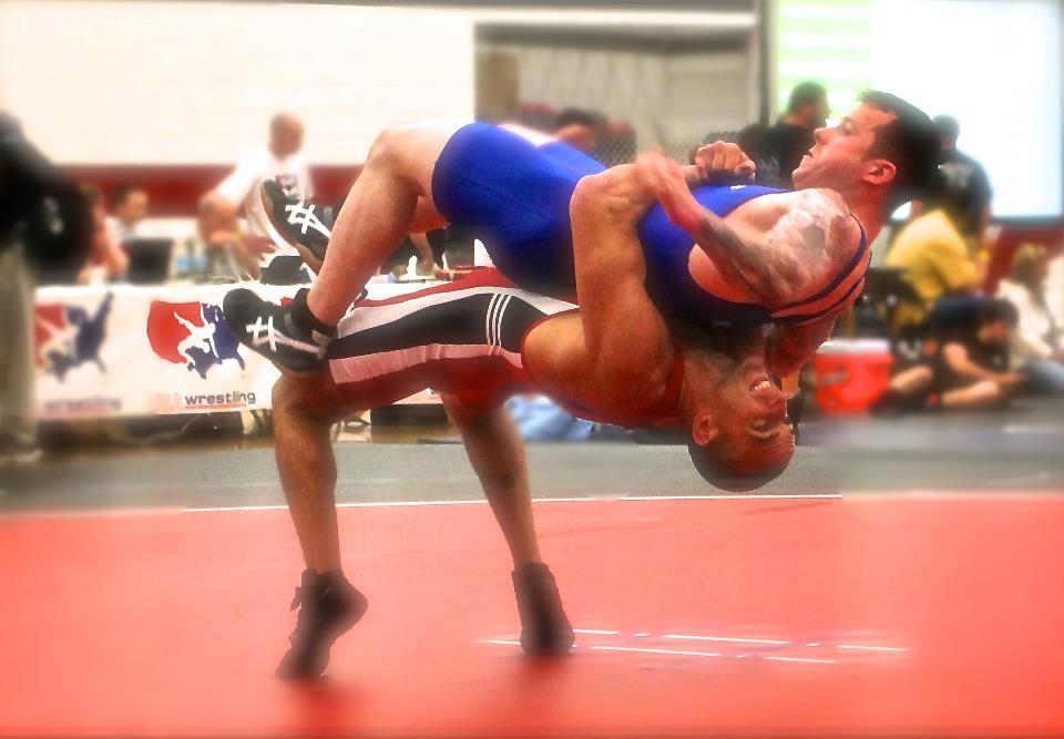 Joe Uccellini launching an opponent in a Greco Roman wrestling match